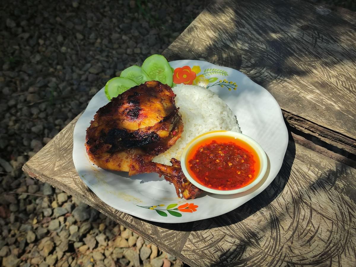 Indonesian grilled chicken with steamed rice.
