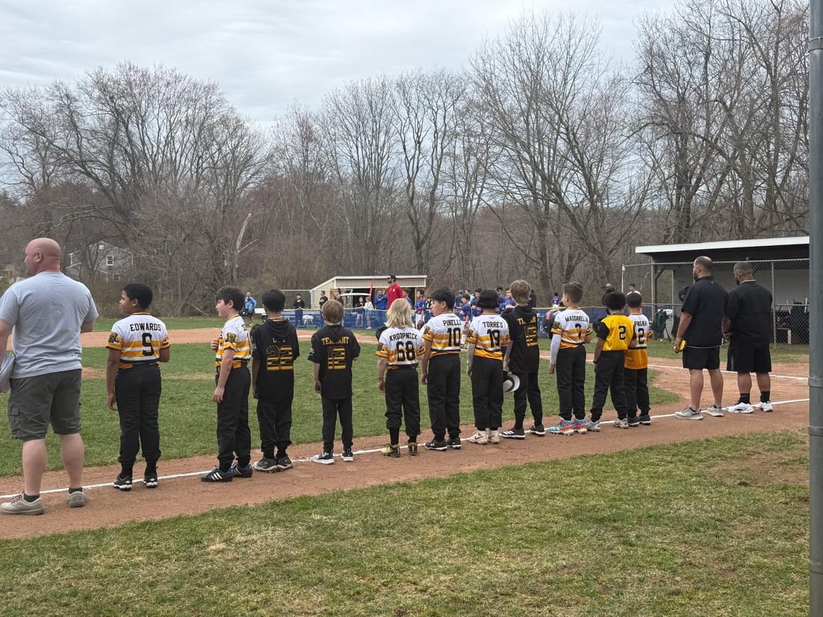 Park City Bulldogs baseball team during national anthem.