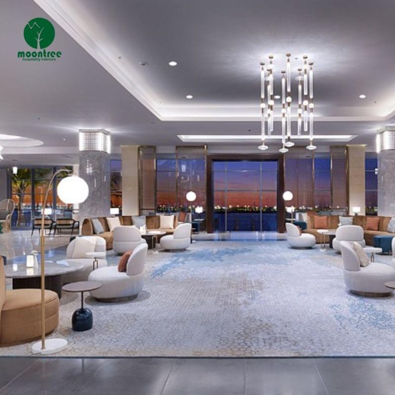 Grand Marble Hotel Lobby Furniture Solution | Custom Fixed Architectural Elements & Movable Seating