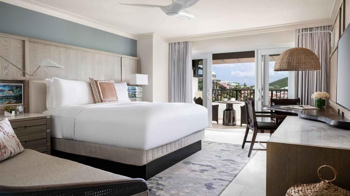 Moontree designed this luxury guest suite at The Ritz-Carlton St. Thomas, a 5-star Caribbean resort with ocean-view balconies and premium tropical-inspired interiors.