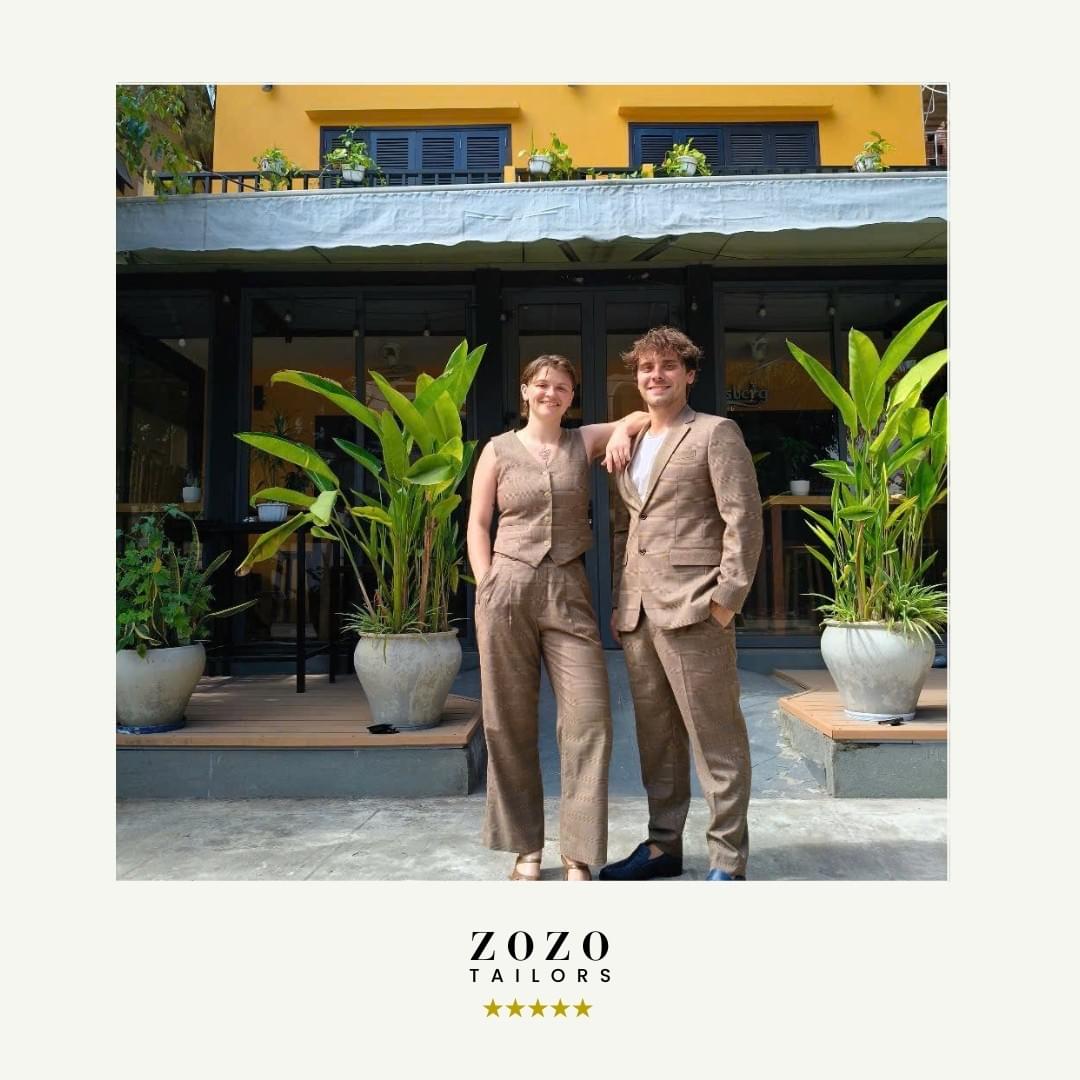 Couple wearing tailoring in the same cashmere fabric with two different styles