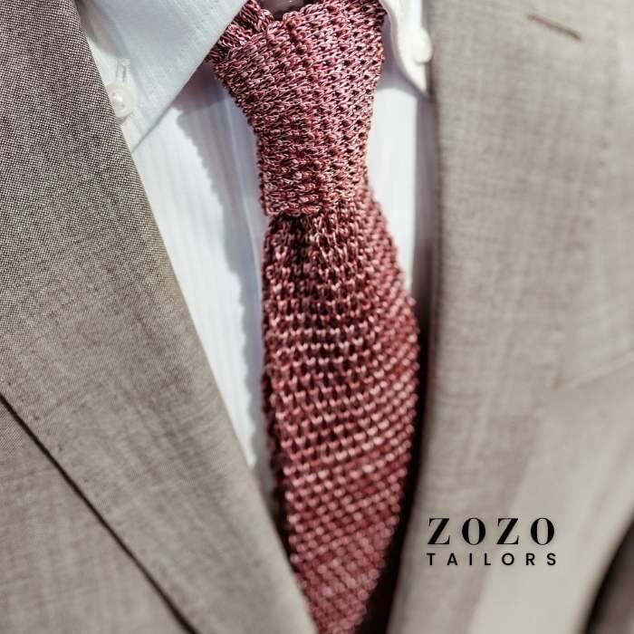 Lightweight suit jacket with textured shirt and tie — perfect for smart casual events that call for relaxed yet intentional presence.