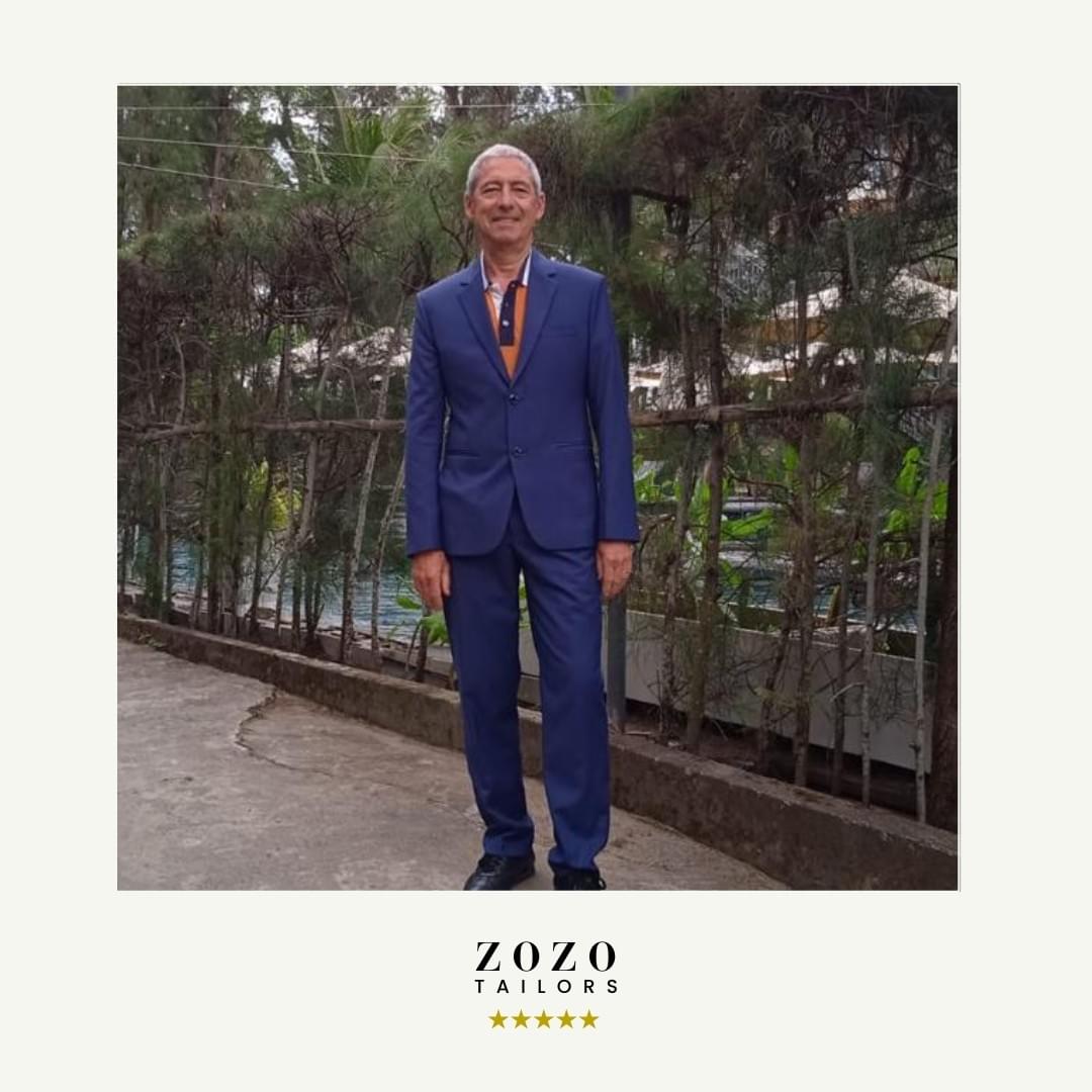 Person wearing a cobalt blue tailored suit for relaxed evenings out