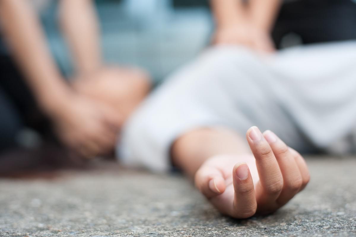 In the context of group medical insurance for employees, work colleagues help a team mate who has collapsed at work