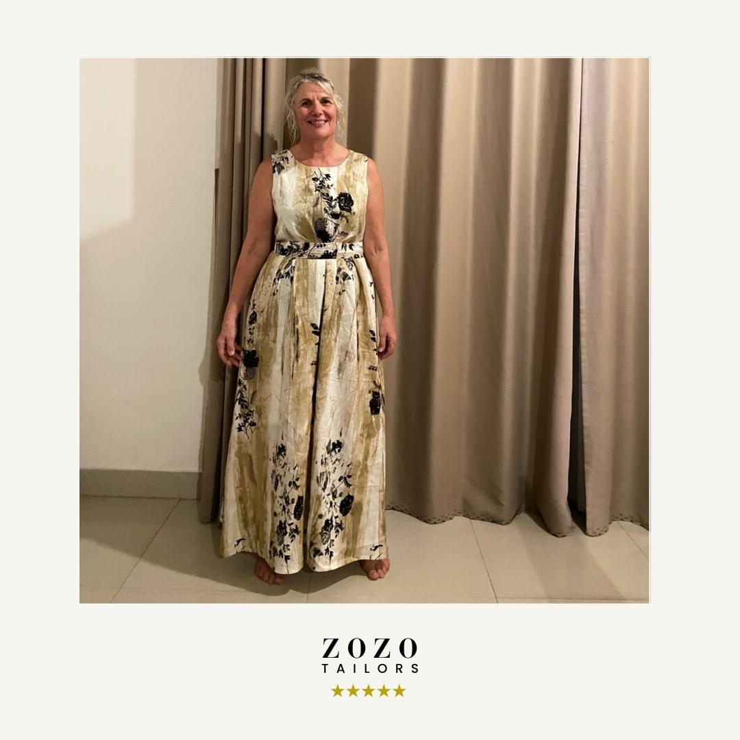 Lois wearing a newly made full-length silk dress in Hoi An, inspired by a long-loved favourite garment.