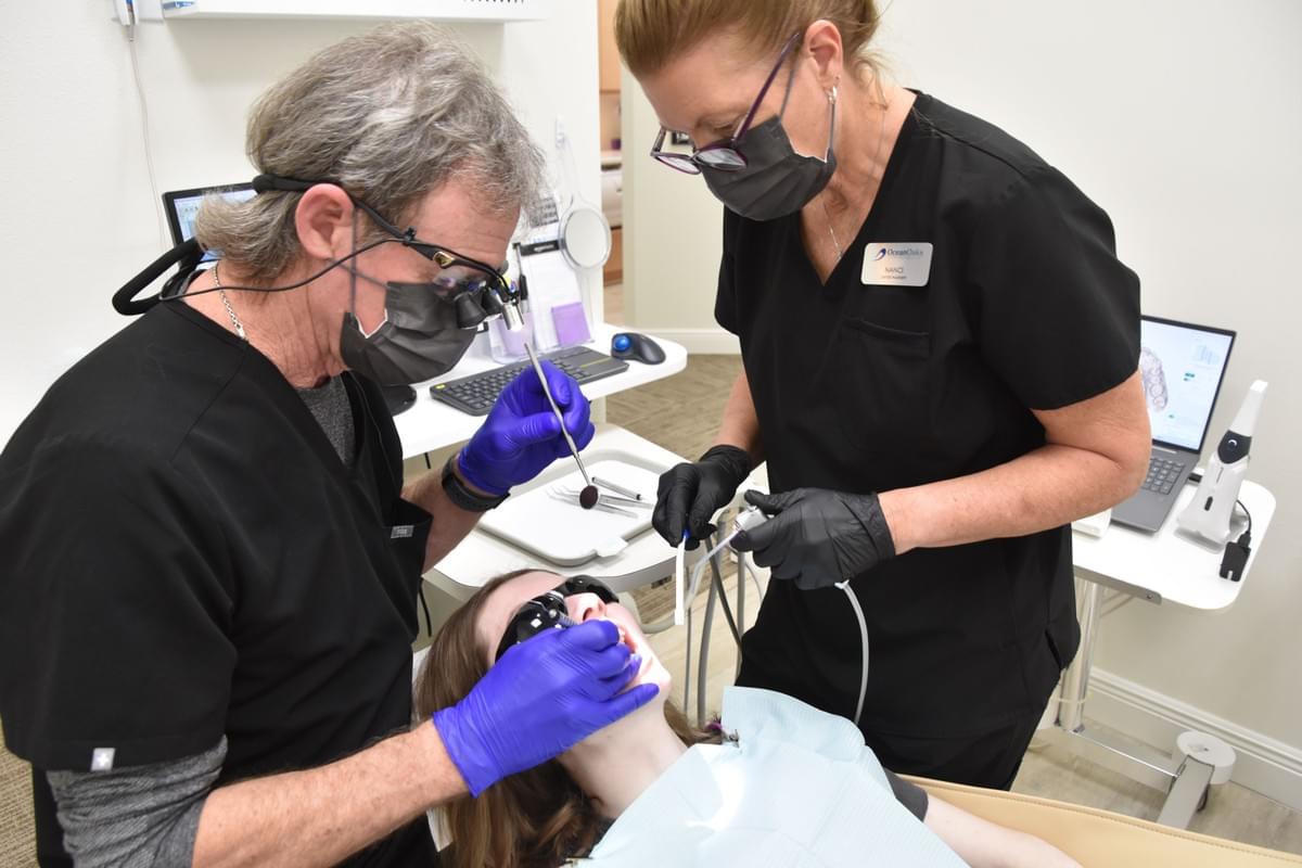 Dental Assistant working with Dentist