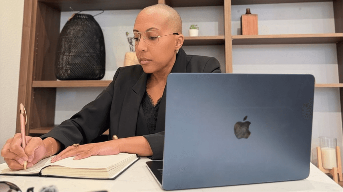 Ashley Bryant working at her desk