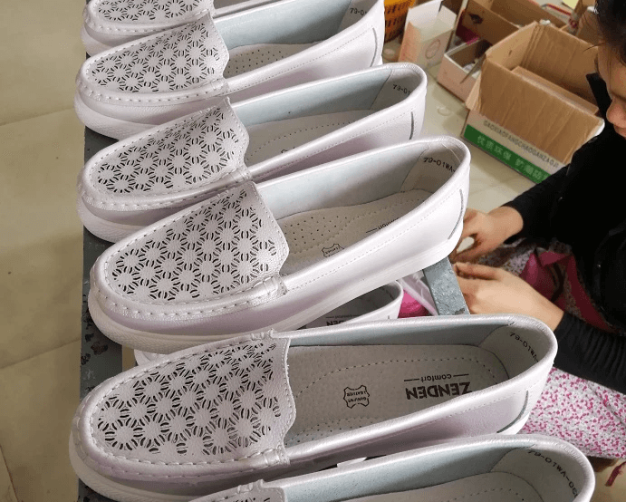 mass production in Quanzhou Xuanfeng Footwear Co., Ltd Warehouse