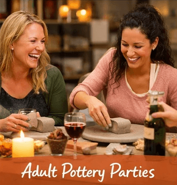 Group hand-building pottery during an adult pottery party