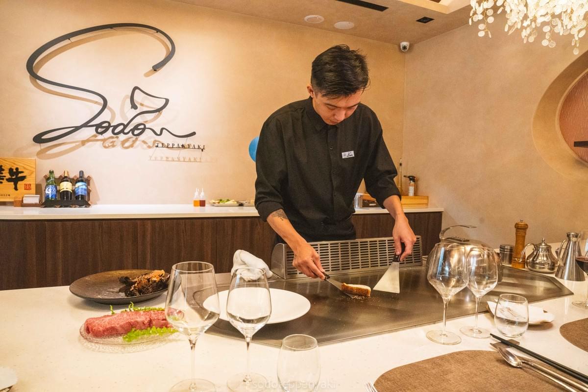 SODO teppanyaki is located in the Da'an District of Taipei City, hidden within the rhythm of the city, yet possessing a unique tranquil quality. We are a restaurant dedicated to providing a high-end teppanyaki dining experience, based on European culinary spirit and centered around Taiwan's seasonal ingredients, offering each guest a dining landscape that combines warmth and artistry. 

SODO offers exquisite lunch and dinner set menus, with dishes changing with the seasons, blending classic and creative elements, specifically designed for couple dates, business banquets, and important holiday celebrations. Here, dining is not just an act of satisfying the taste buds, but a sensory journey woven together by sight, sound, smell, taste, and emotion. 

We value: 

The source and quality of ingredients — carefully selected seasonal seafood and land ingredients, delivered directly from the source. 

The rhythm and aesthetics of cooking — culinary skills like a performance, with perfect timing. 

The warmth and experience of the space — Japanese minimalist design coexisting with warm hospitality. 

SODO is not just a restaurant, but a space for you to share time with important people, a ritual worth savoring and storing deep in memory. 

The website features a black tone as the base, with noble colors that highlight a high-end quality.