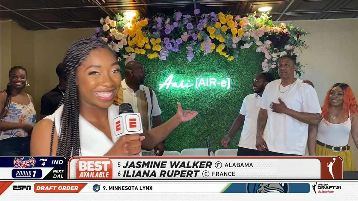 Photo of Aari from draft night, showing floral background with "Aari [AIR-e]" in neon letters.