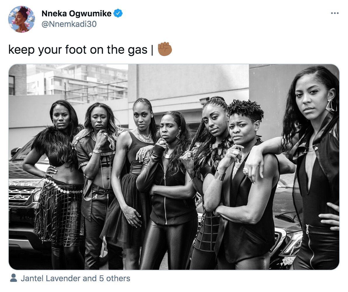 Screenshot of tweet by Nneka: "Keep your foot on the gas | [black fist emoji]" with black and white image of Sparks players posing with fierce expressions in black, leather, fur looks, 