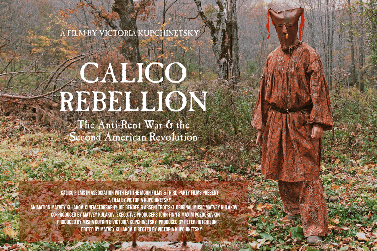 Photograph of a person dressed in patterned, historical-style clothing standing in a wooded area with autumn foliage, serving as a promotional poster for the film "Calico Rebellion." Text overlay includes film title, subtitle "The Anti-Rent War & the Second American Revolution," and credits, emphasizing historical and revolutionary themes. Photograph of a person dressed in patterned, historical-style clothing standing in a wooded area with autumn foliage, serving as a promotional poster for the film "Calico Rebellion." Text overlay includes film title, subtitle "The Anti-Rent War & the Second American Revolution," and credits, emphasizing historical and revolutionary themes.
