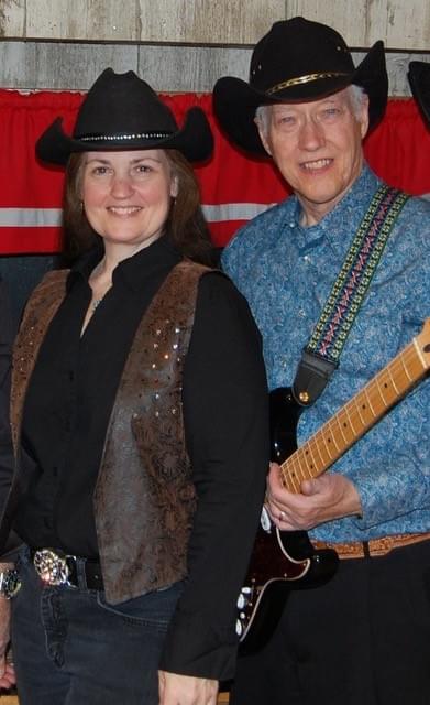 Terri Whitney and Larry Jamieson standing next to each other. Terri Whitney and Larry Jamieson standing next to each other.