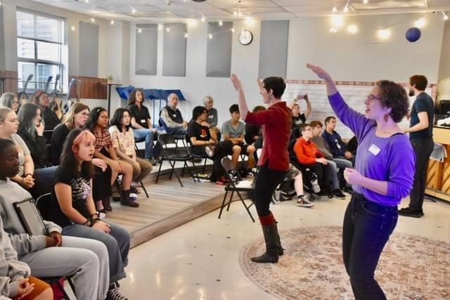 Windborne interacting with school choir. Windborne interacting with school choir.