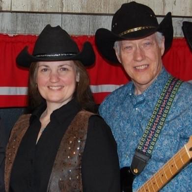 Terri Whitney and Larry Jamieson standing next to each other.