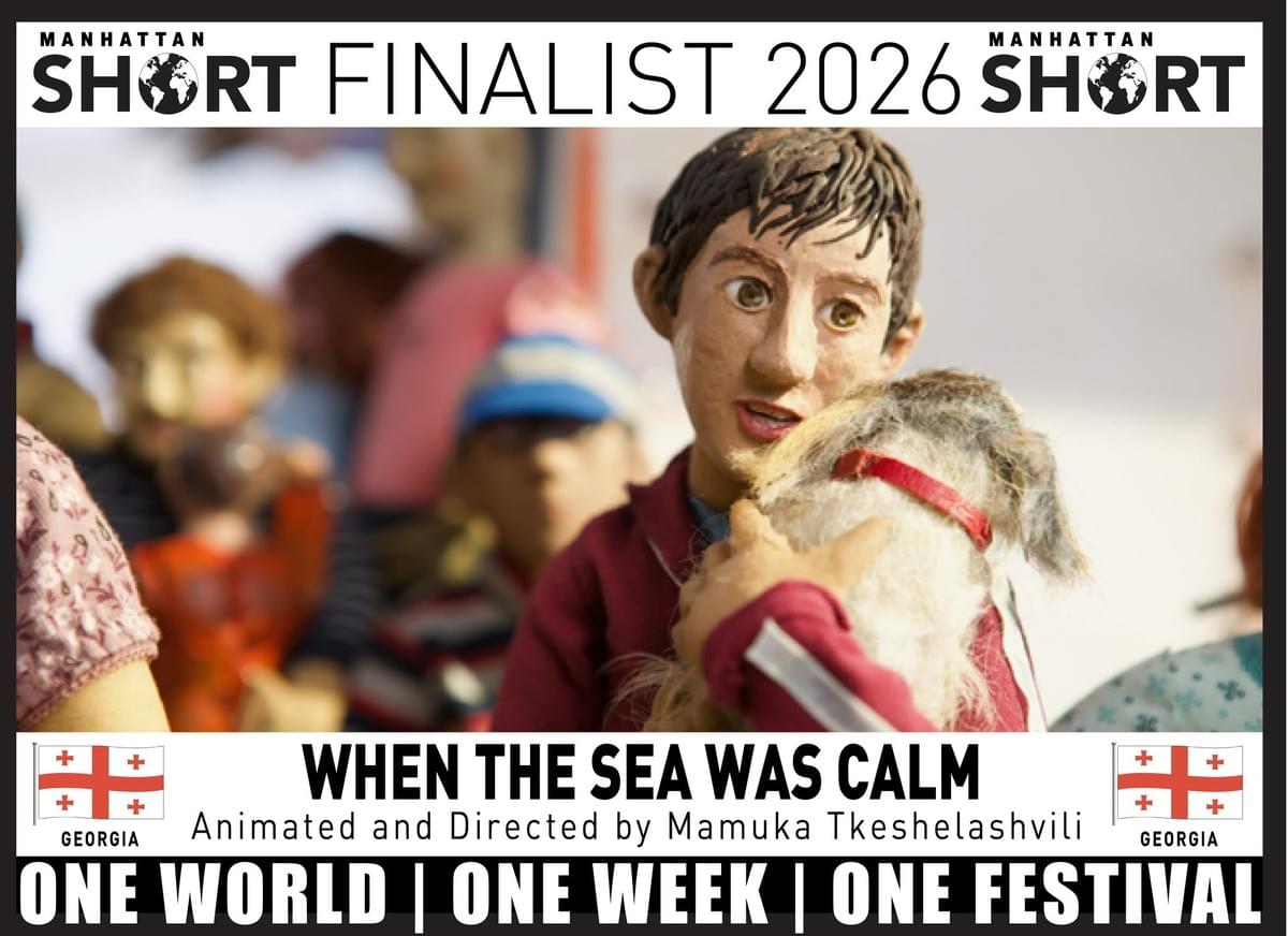 Promotional festival poster announcing *When the Sea Was Calm* as a Manhattan Short Finalist 2026 selection, animated and directed by Mamuka Tkeshelashvili. Central puppet-like boy holds a small dog, with Georgia flags flanking title and bold footer reading “One World | One Week | One Festival.” Promotional festival poster announcing *When the Sea Was Calm* as a Manhattan Short Finalist 2026 selection, animated and directed by Mamuka Tkeshelashvili. Central puppet-like boy holds a small dog, with Georgia flags flanking title and bold footer reading “One World | One Week | One Festival.”