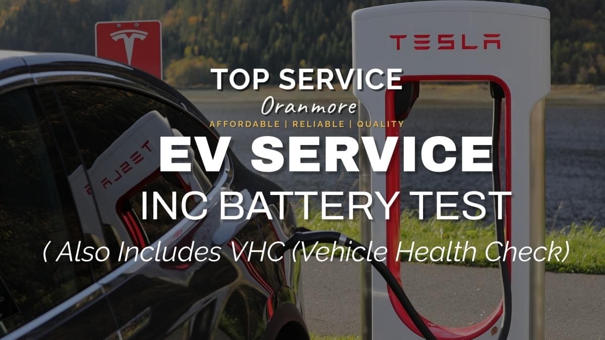 "Car undergoing full service with oil, fluids, and filter check at Top Service."