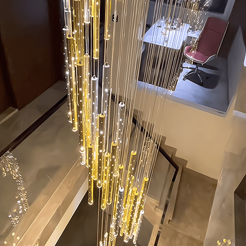 LED long strip chandelier for sleek and modern stairwell illumination.