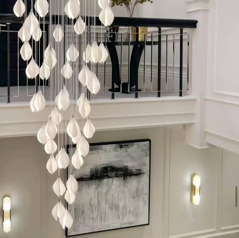 Ceramic bloom flower pendant chandelier adds artistic flair to staircases.