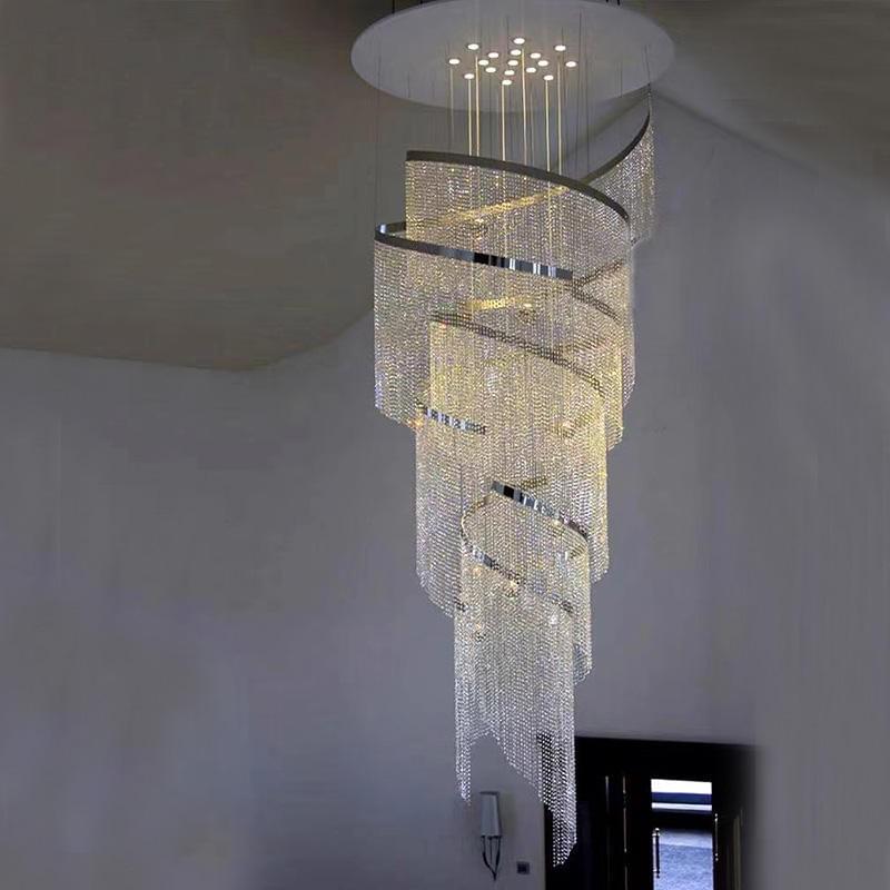 Spiral crystal chandelier adds luxury and elegance to modern stairwells.