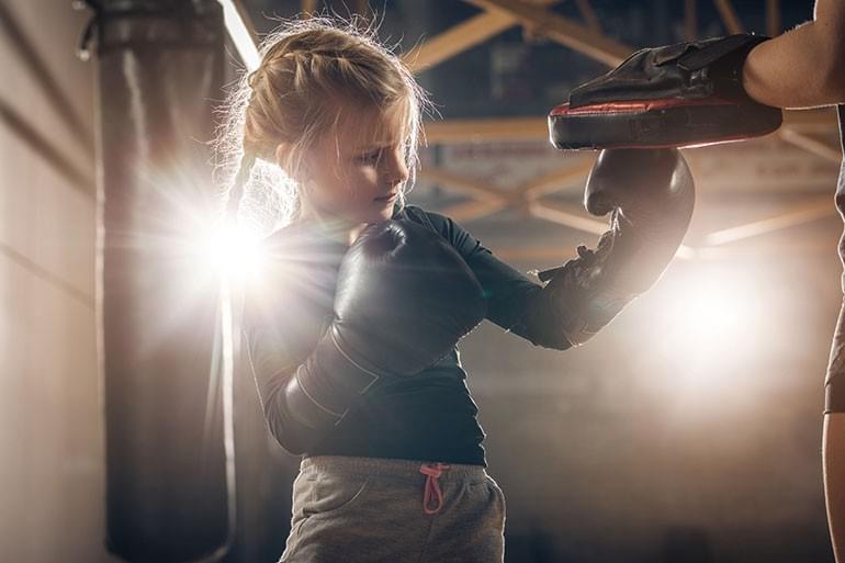 A girl learning martial arts.