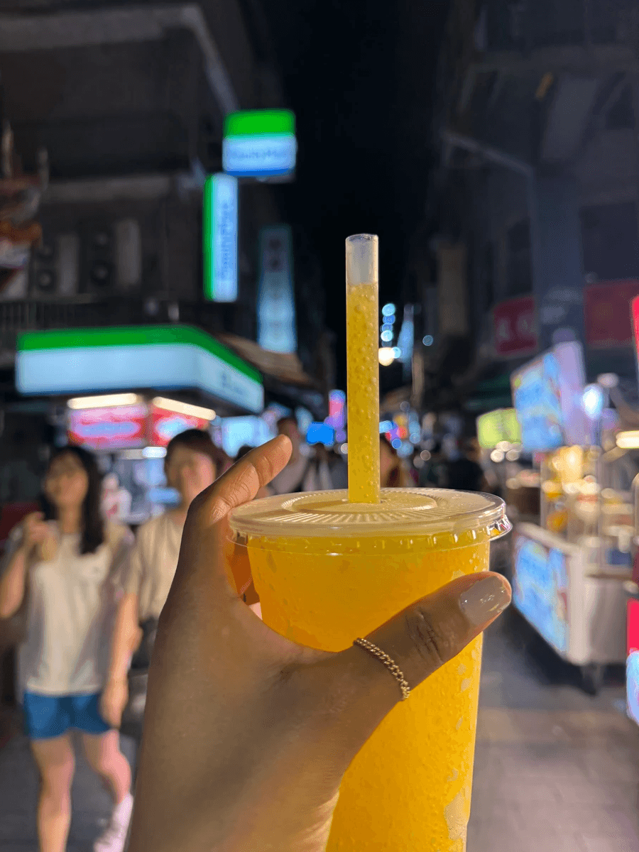A yummy and refreshing Mango flavored slushie smoothie in a night market street
