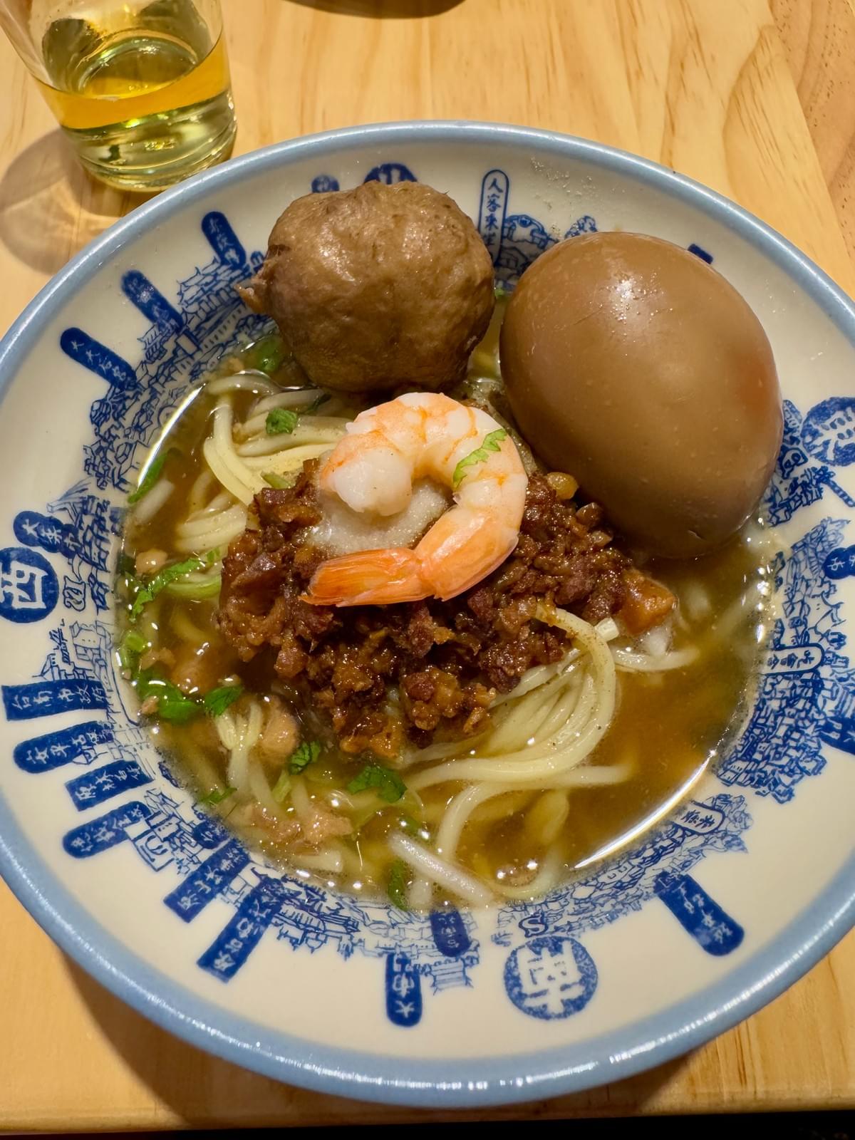 Dan Zai Noodles Ta-a noodles or danzai noodles minced pork, prawn, bean sprouts, cilantro, black vinegar, garlic, soy sauce and egg Soup in the Dihau Old Street market