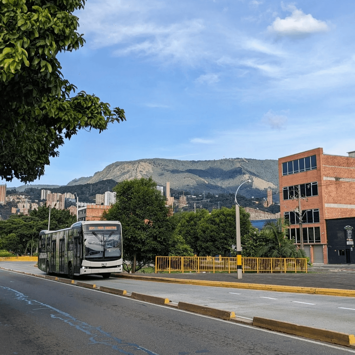 MetroPlus electric rapid bus line coming down the street