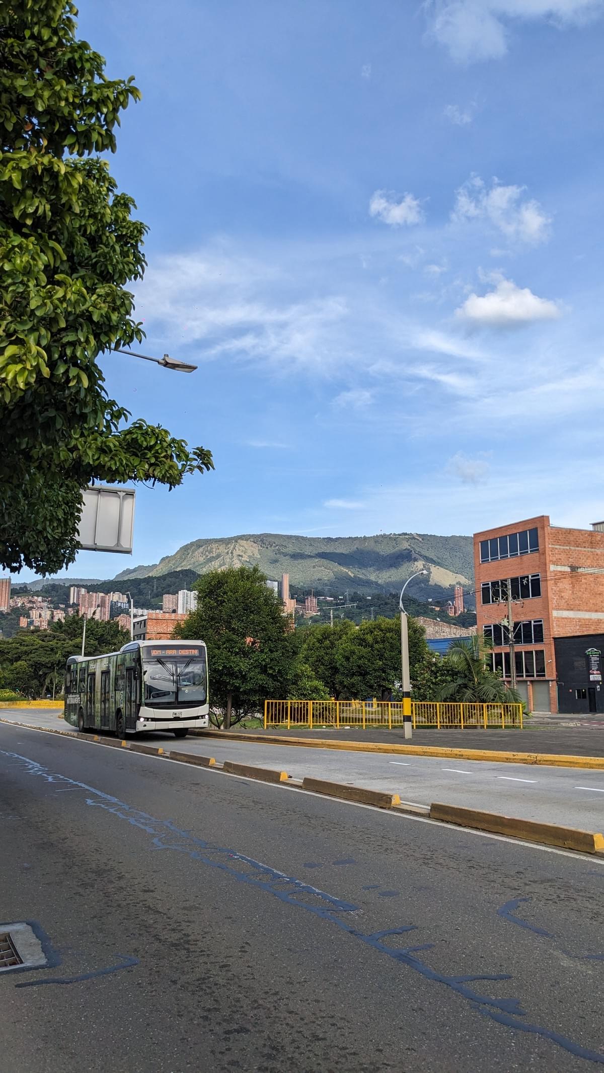 MetroPlus electric rapid bus line coming down the street