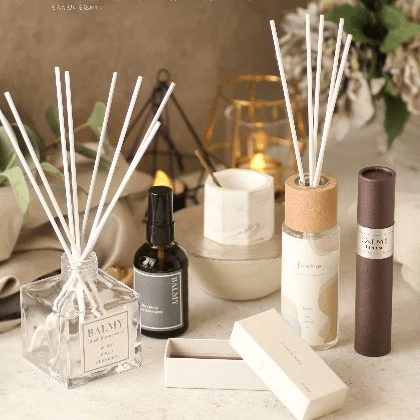 Japanese botanical incense laid beside a bronze burner — pure plant essence.