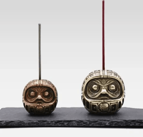 Japanese incense holder in solid bronze, featuring minimalist holes for fragrance diffusion.