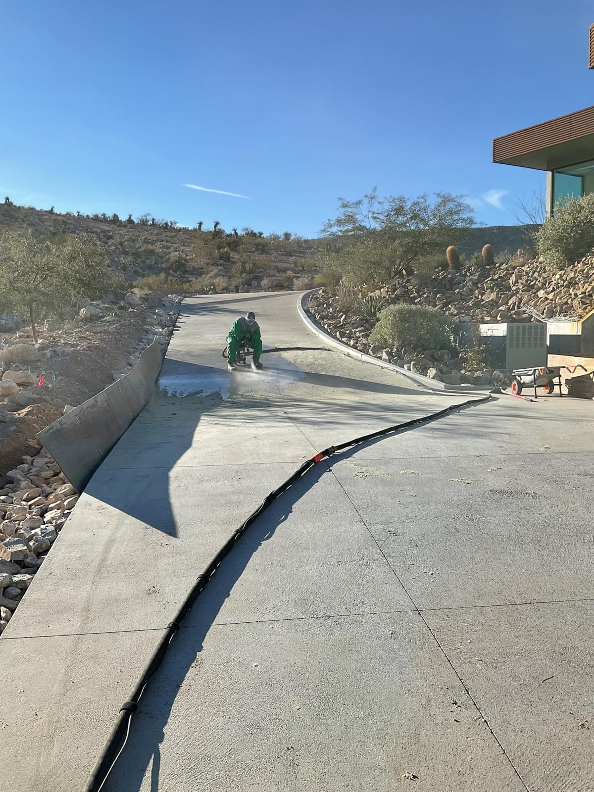 Restoring a Pebble Tec Driveway Sandblasting Driveway...