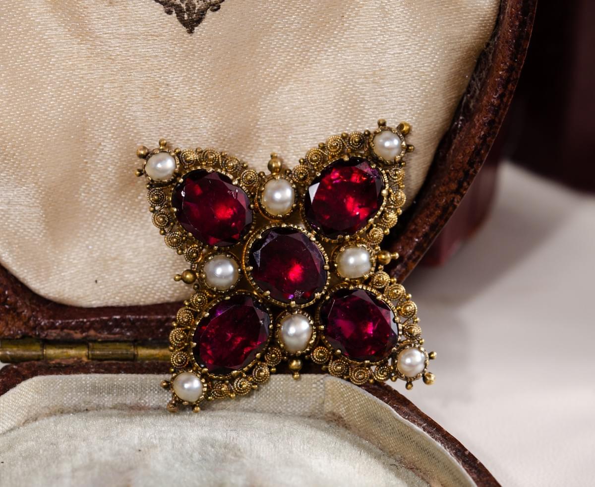 Garnet and pearl cross brooch