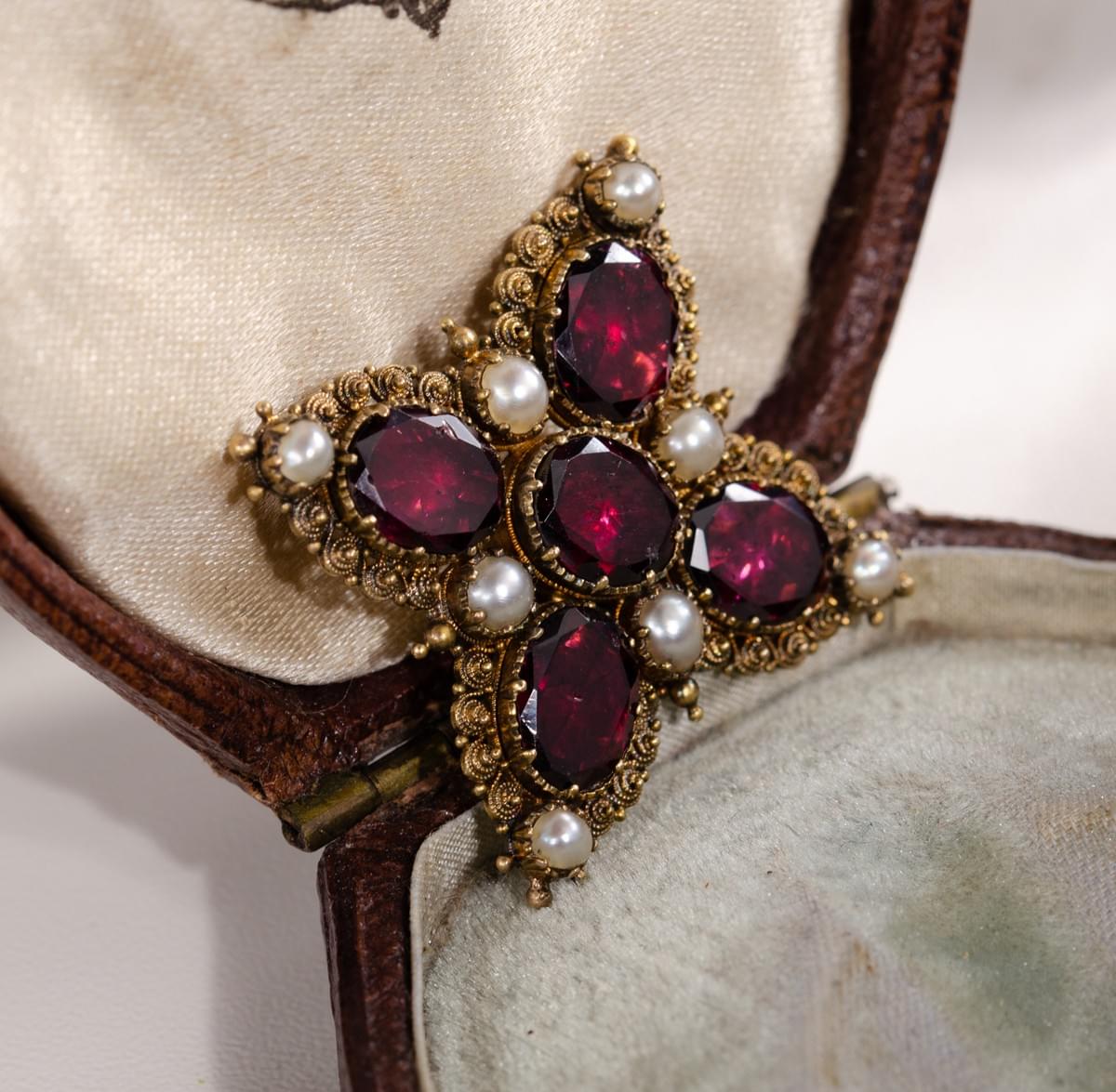 Garnet and pearl cross brooch