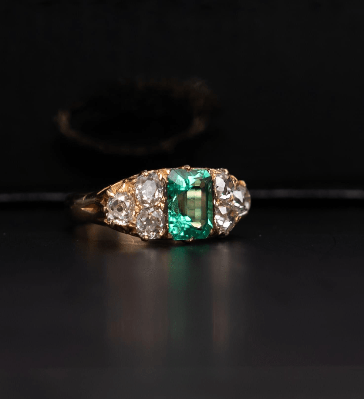 Emerald and diamond ring