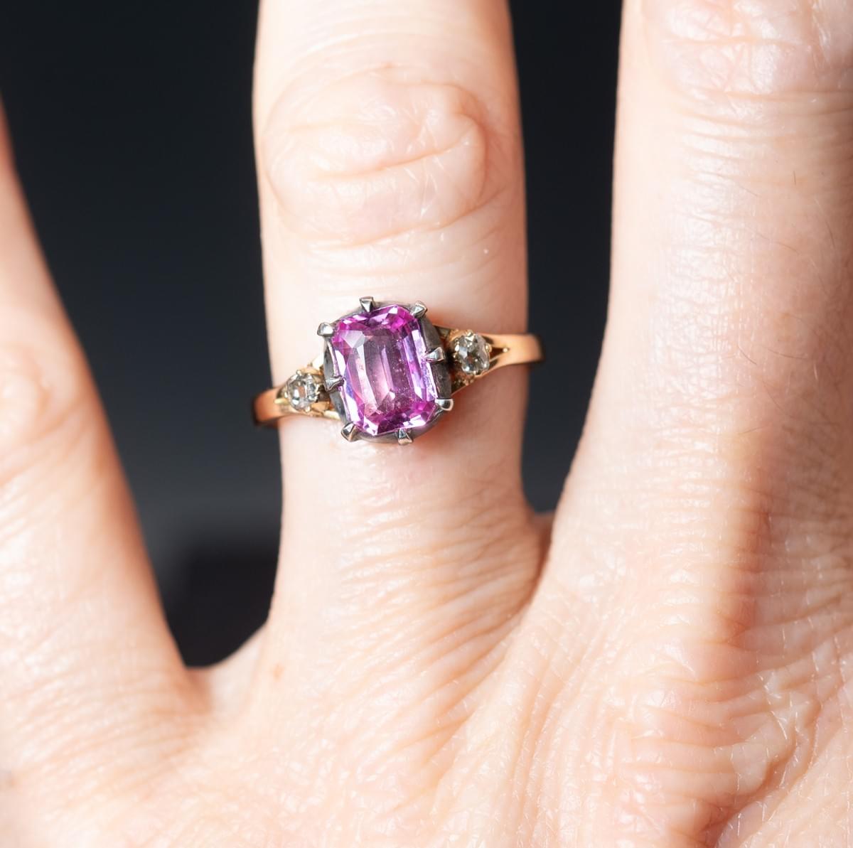 Pink sapphire and diamond ring