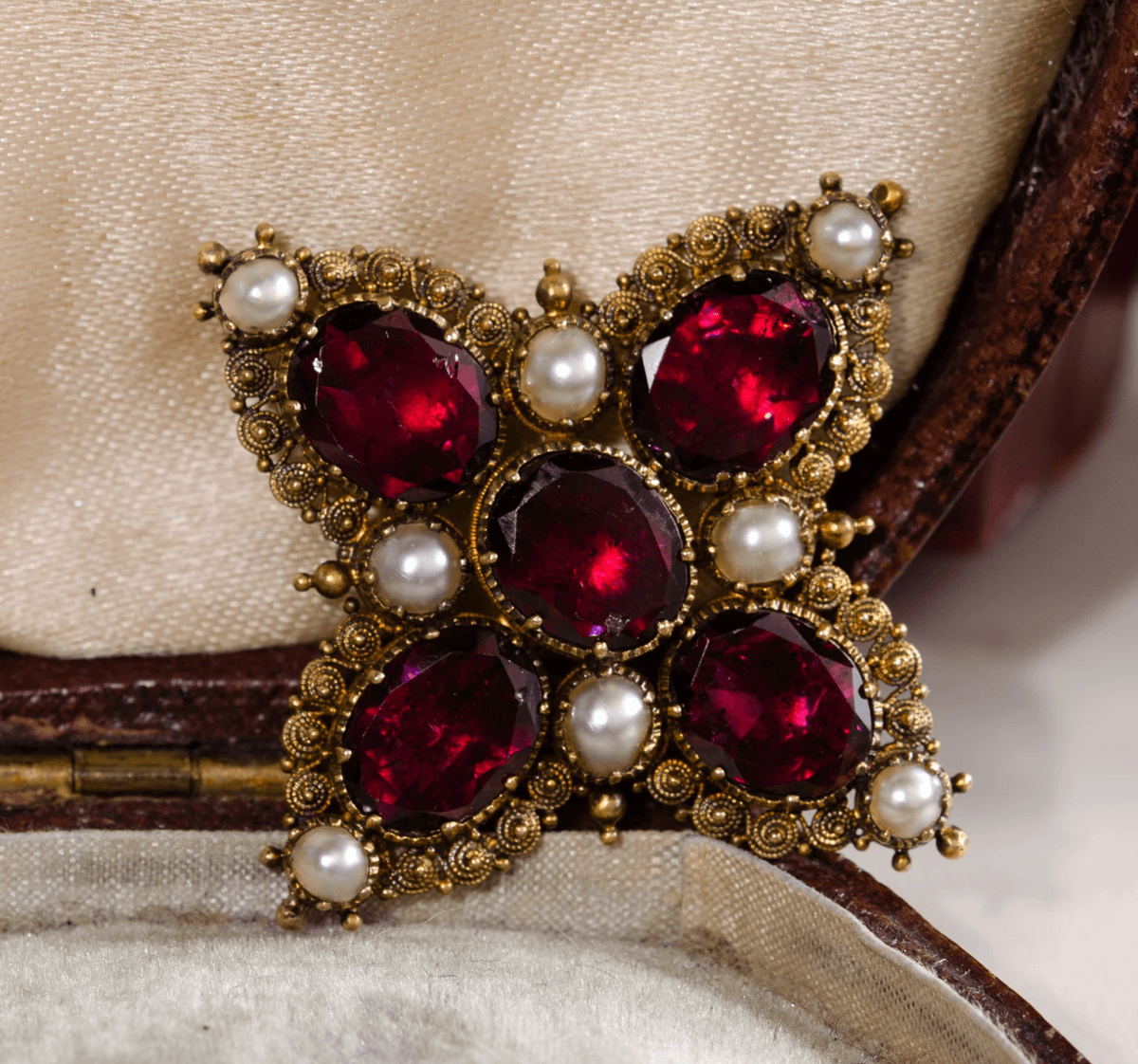 Garnet and pearl cross brooch