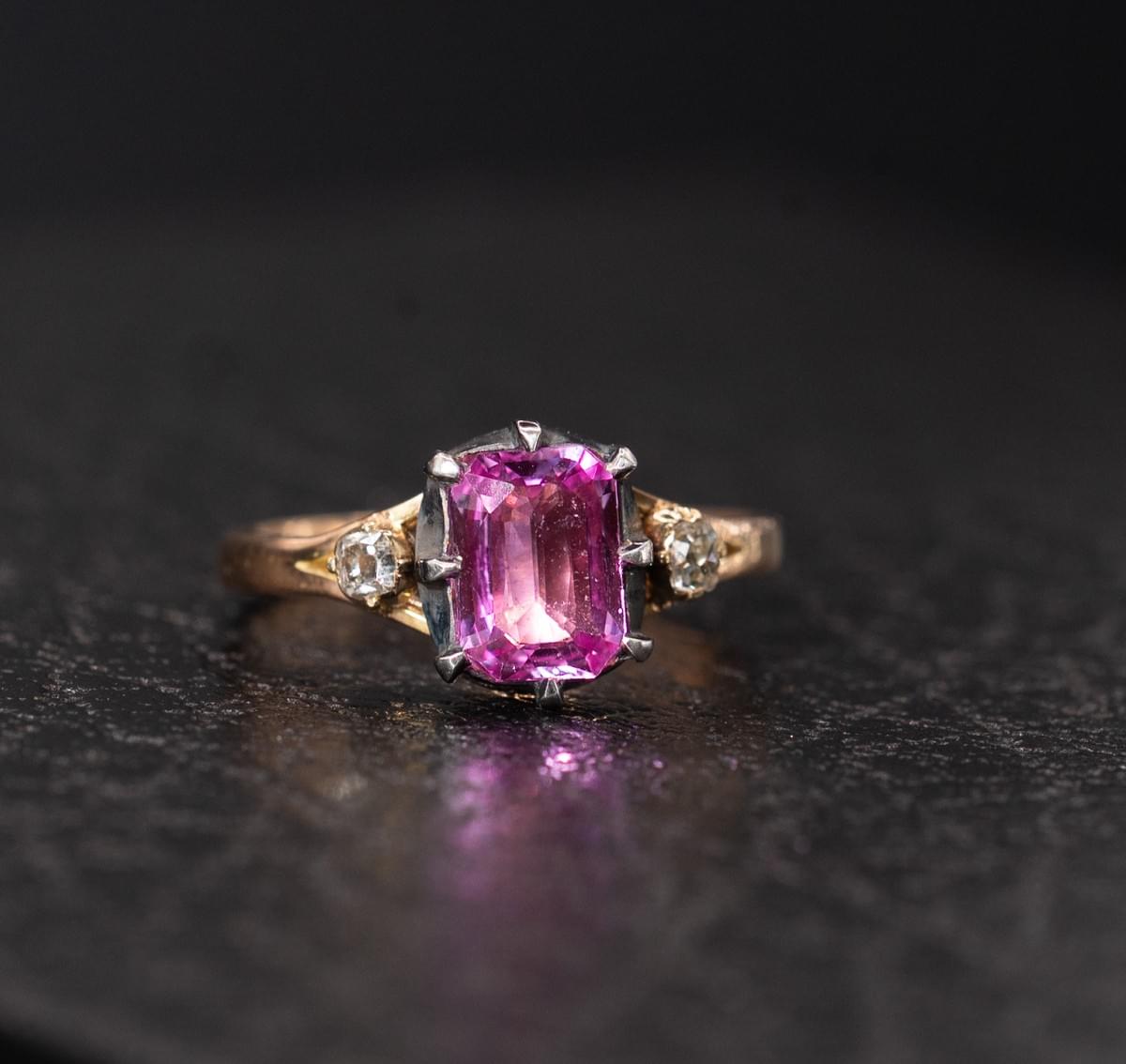 Pink sapphire and diamond ring