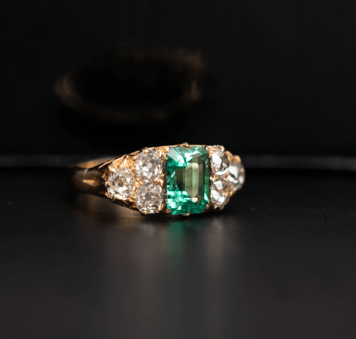 Emerald and diamond ring