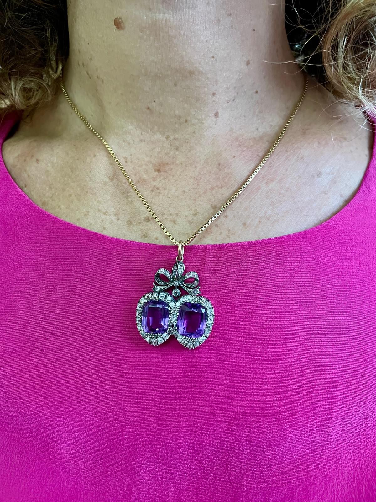 Double heart amethyst and diamond pendant