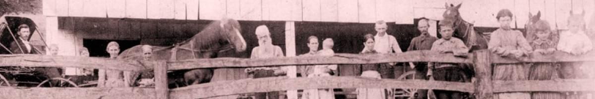 Photo of family at their barn.