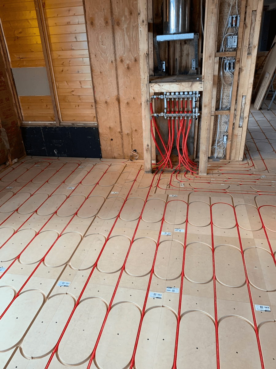 In floor heating and control panel before the finish flloor is installed. 