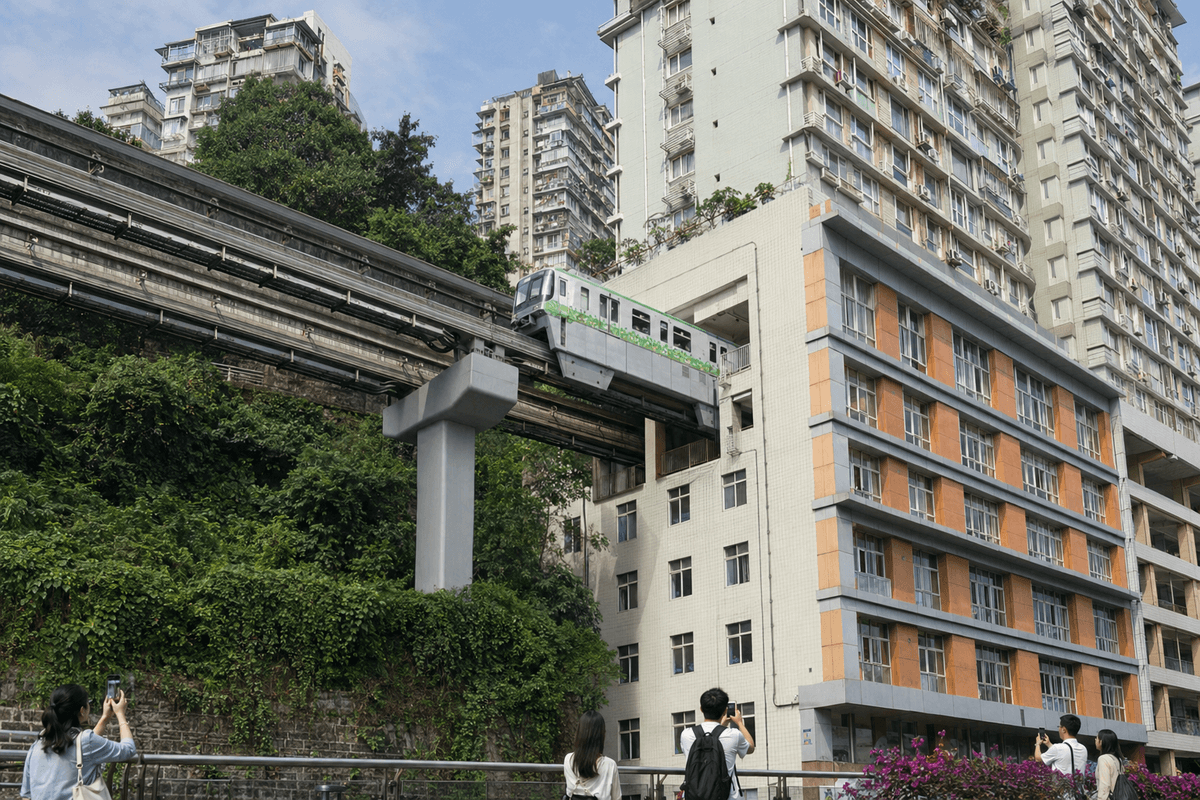 Chongqing monorail train passing through the Liziba Station residential building