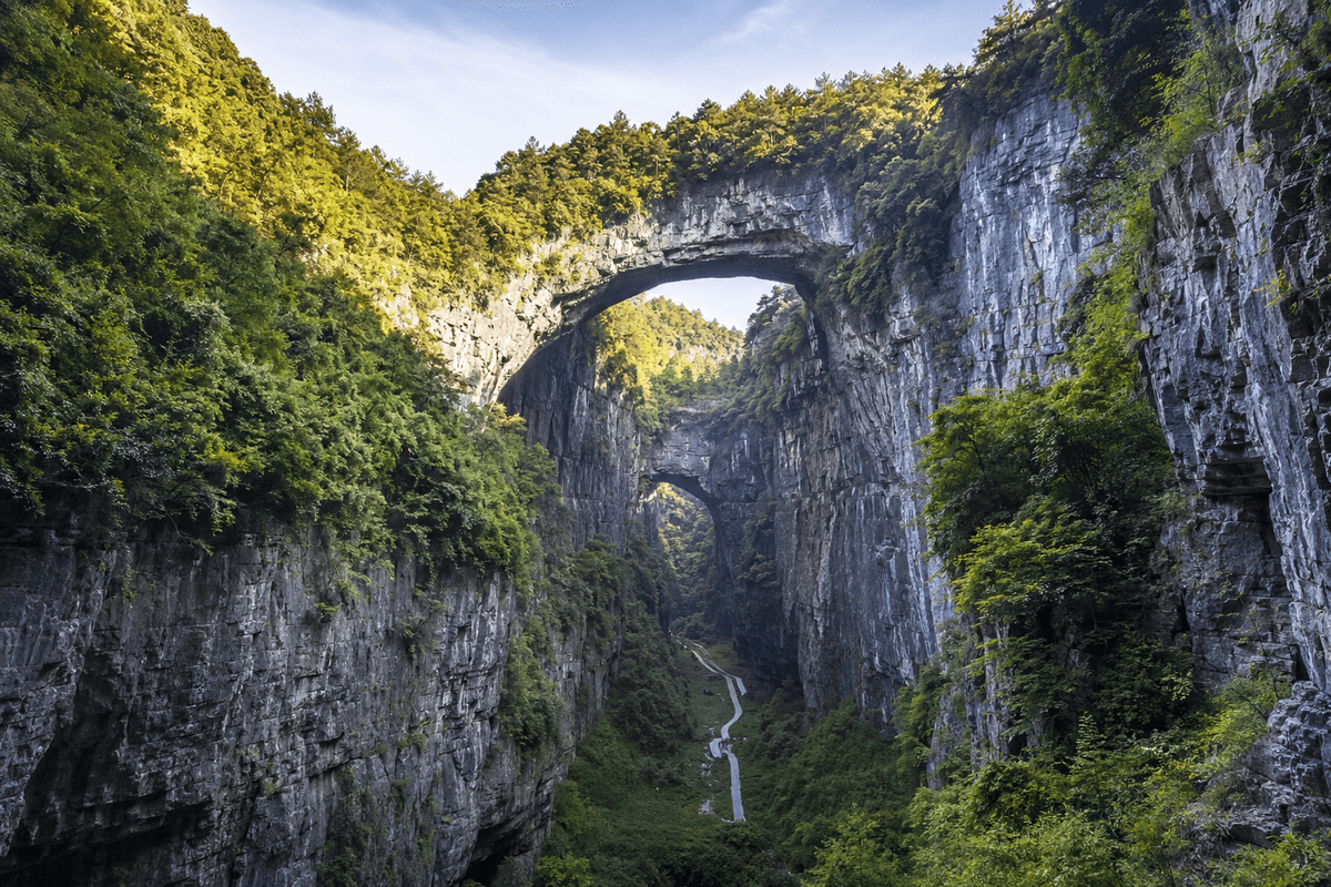 Natural limestone bridges and forested cliffs at Wulong Karst near Chongqing, China
