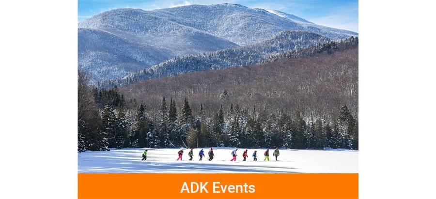 ADK Events - Photo of people hiking through the snow.