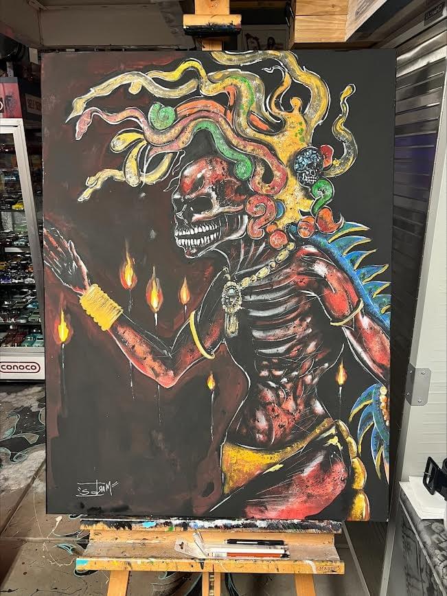 Aztec-inspired skeleton figure with flowing hair and candles by Latino artist Jose Mares Refried Rockabilly