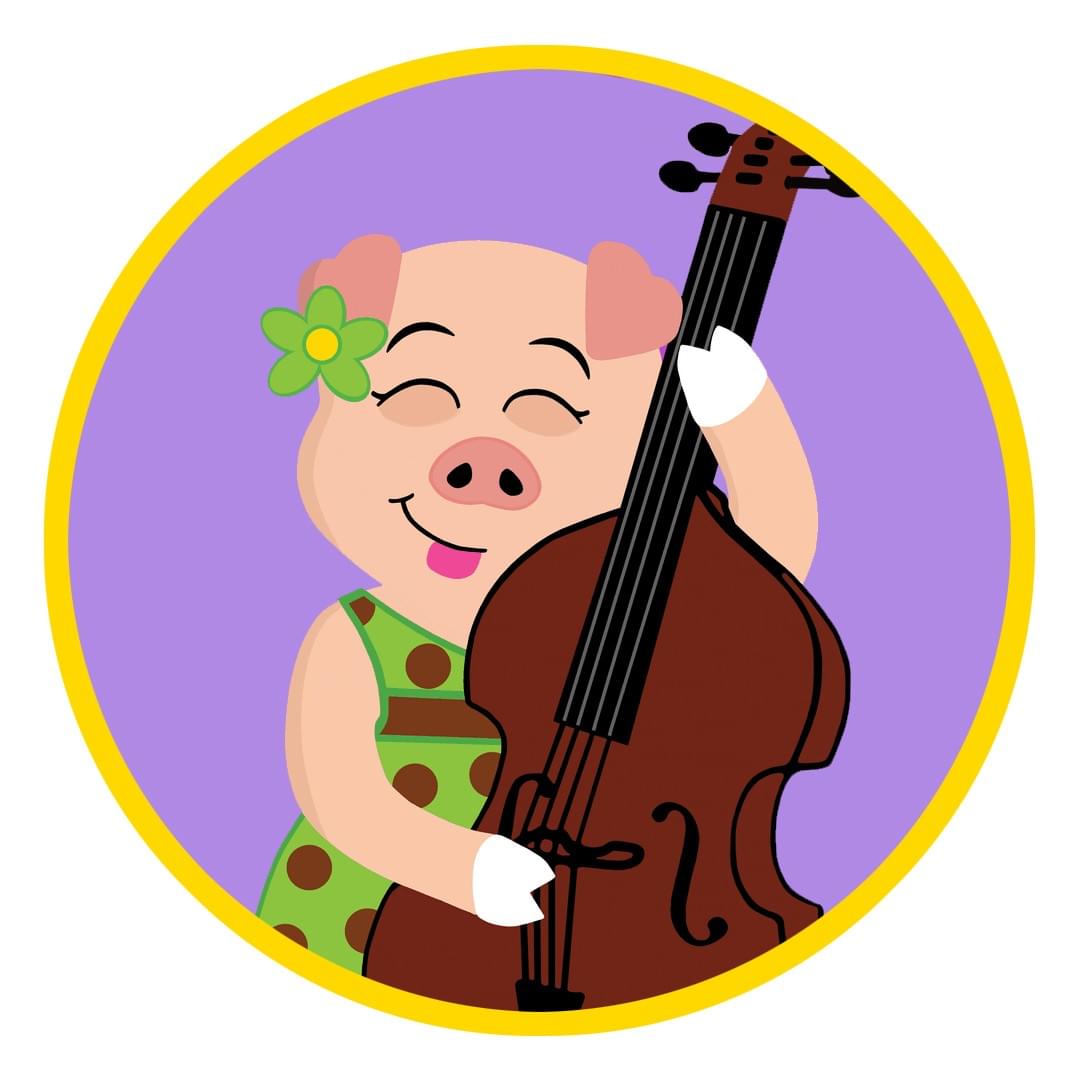 Dotty Pig playing her bass guitar with her tung out in Harmony Ridge