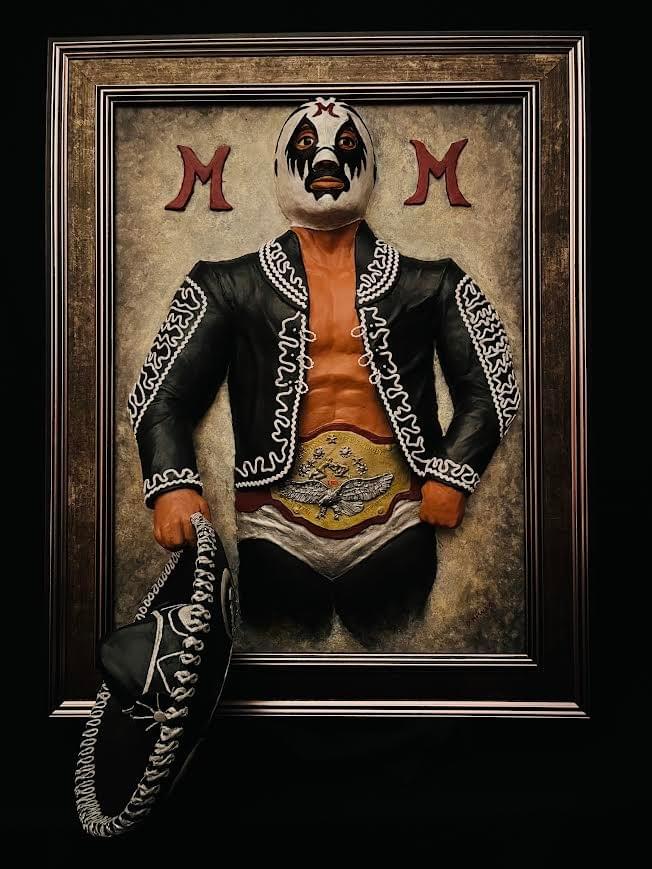 High relief sculpture of masked lucha libre wrestler with traditional attire by David Morales