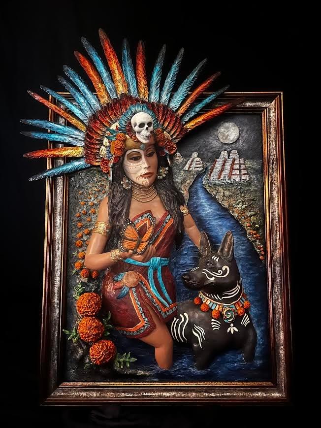 Aztec inspired warrior woman with feather headdress and Xolo dog in high relief sculpture by David Morales